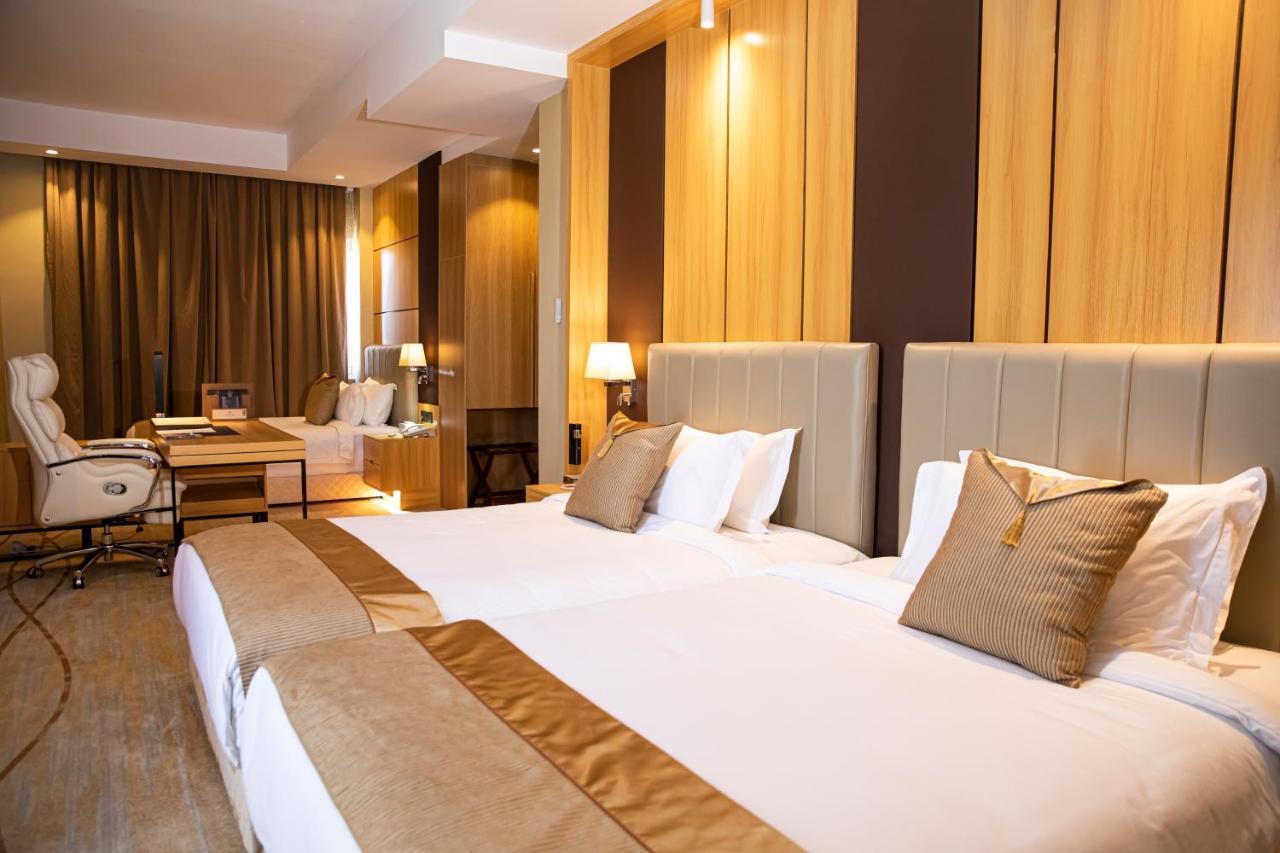 Hotel Diamond Prishtina Pristina Exterior photo A room at the hotel