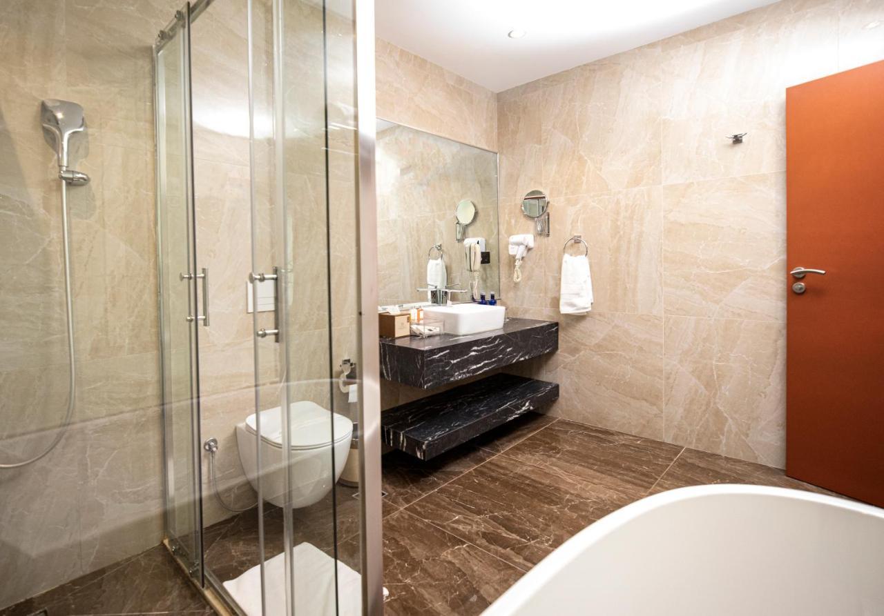 Hotel Diamond Prishtina Pristina Exterior photo A bathroom in a hotel