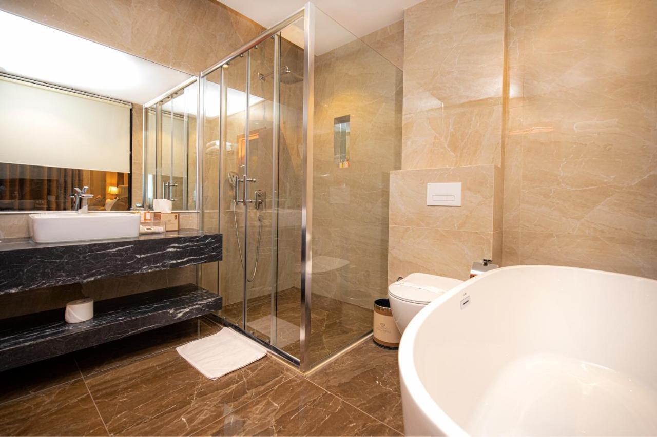 Hotel Diamond Prishtina Pristina Exterior photo A bathroom with a shower enclosure