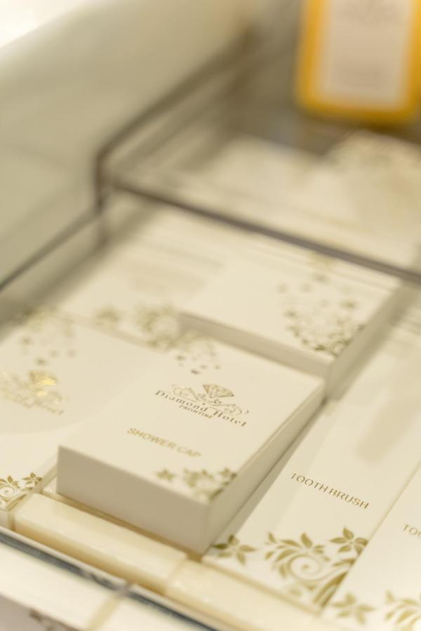 Hotel Diamond Prishtina Pristina Exterior photo A gold-embossed invitation